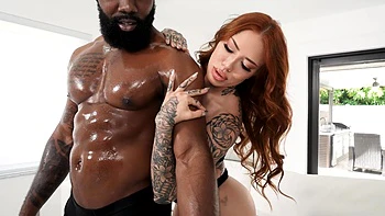 Redhead hottie Lacey Jayne gets oiled and fucked hard.