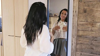 Stefania, with big natural tits, enjoys solo masturbation while showing off her huge boobs.