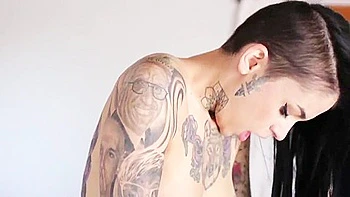 Tattooed Lesbo Goths Slide Their Tongues Into Soft Twat