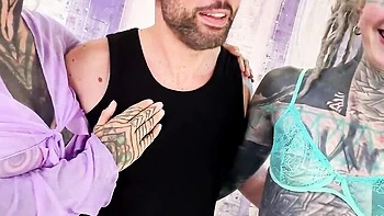 Tattooed Lesbians Squirt on Face with Big Dildo