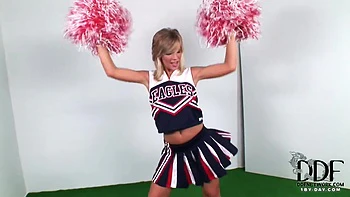 Hungarian Blonde Cheerleader Plays with Toys