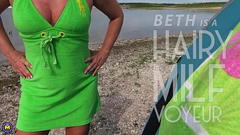 See Voyeur Milf Beth Show Off Her Hairy Pussy At The Beach