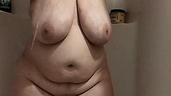 Busty Curly Brunette with Huge Tits Fucks on Couch