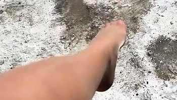 MILF in fishnet enjoys foot fetish